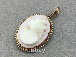 George L Paine Co 10K Left Facing Carved Angel Skin Cameo Pendant with Seed Pearls