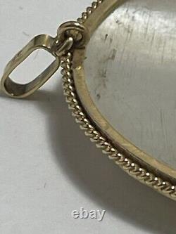 Broche pendentif pour dame en or 18 carats antique avec camée sculpté en nacre de perle, 15 grammes